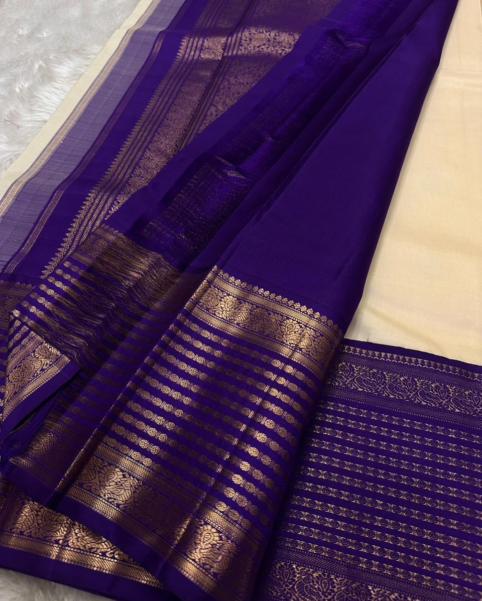 Preferable White And Blue Banarasi Soft Silk Saree With Blouse Piece