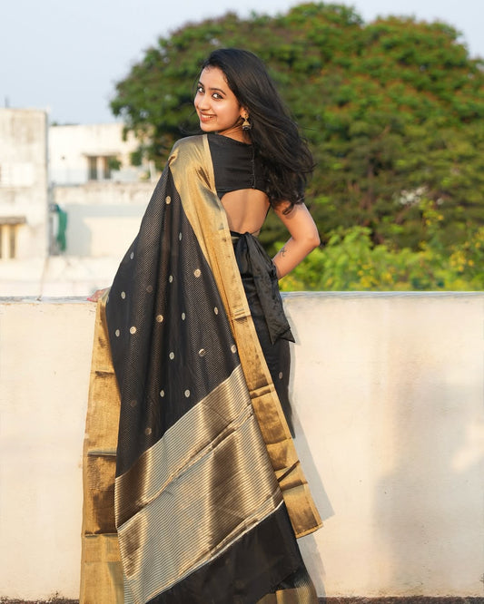 Mesmeric Black Color Banarasi Soft Silk Saree With Blouse Piece