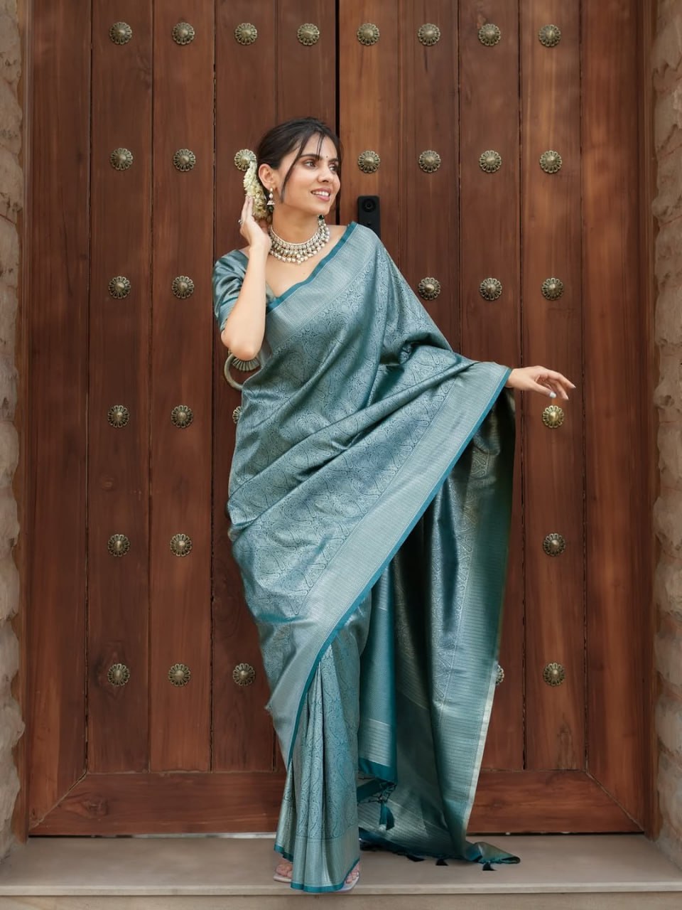 Attractive Firozi Color Banarasi Soft Silk Saree With Blouse Piece