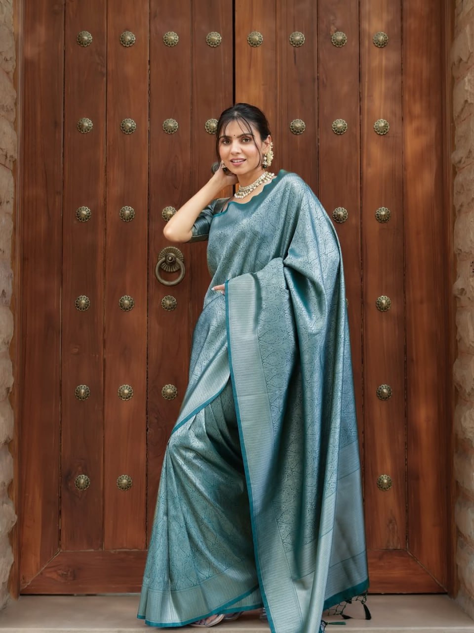 Attractive Firozi Color Banarasi Soft Silk Saree With Blouse Piece