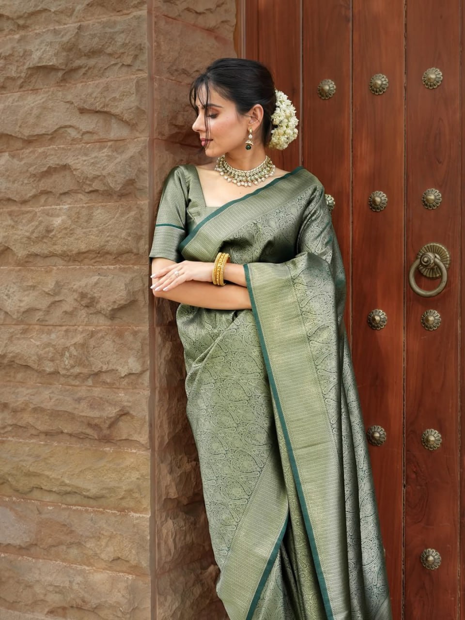 Attractive Green Color Banarasi Soft Silk Saree With Blouse Piece