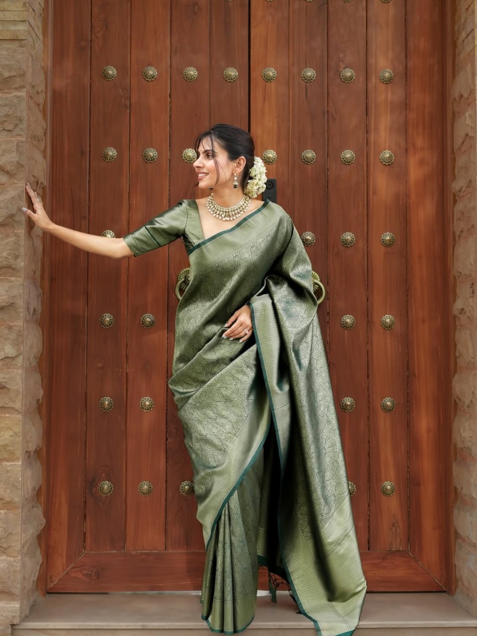 Attractive Green Color Banarasi Soft Silk Saree With Blouse Piece