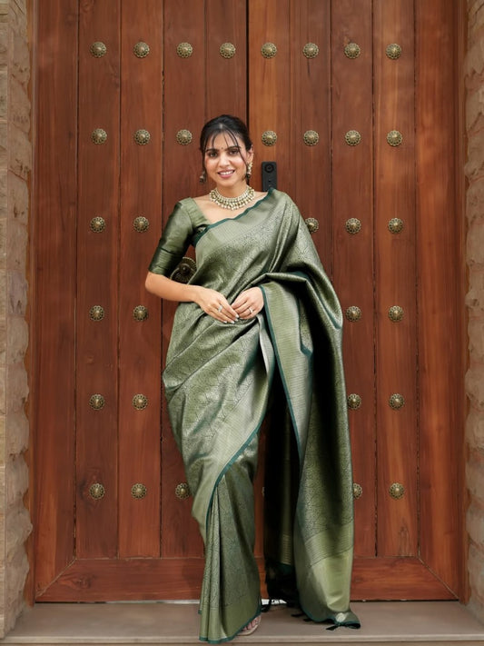 Attractive Green Color Banarasi Soft Silk Saree With Blouse Piece
