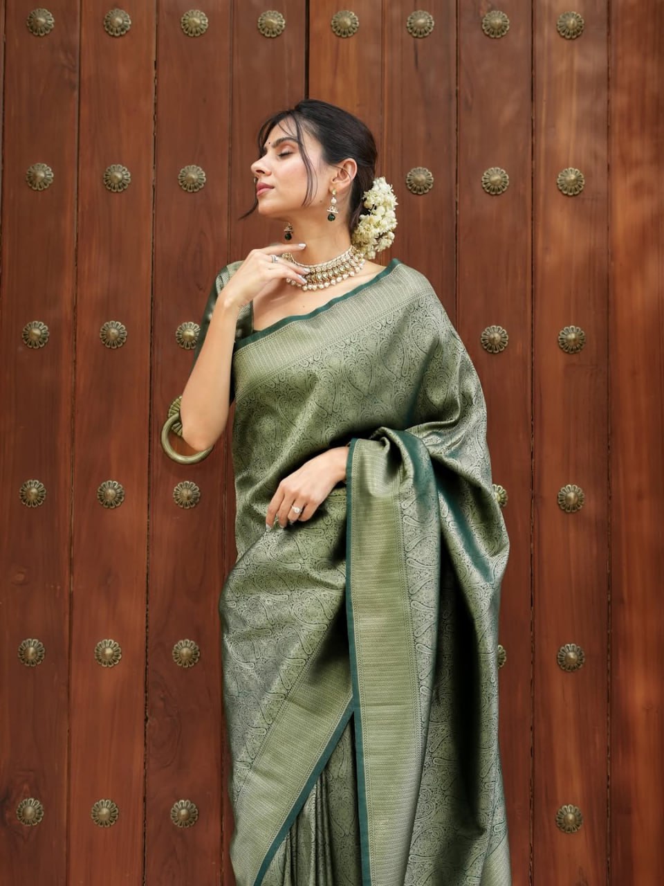 Attractive Green Color Banarasi Soft Silk Saree With Blouse Piece