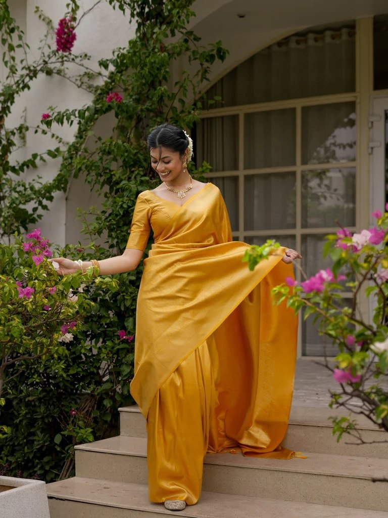 Attractive Yellow Color Banarasi Soft Silk Saree With Blouse Piece