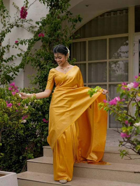 Attractive Yellow Color Banarasi Soft Silk Saree With Blouse Piece