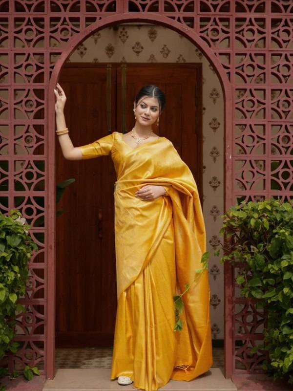 Attractive Yellow Color Banarasi Soft Silk Saree With Blouse Piece