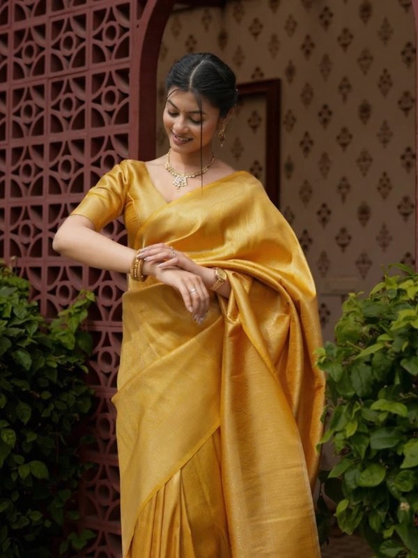 Attractive Yellow Color Banarasi Soft Silk Saree With Blouse Piece