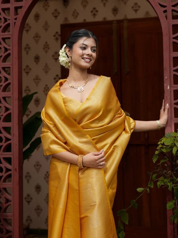 Attractive Yellow Color Banarasi Soft Silk Saree With Blouse Piece
