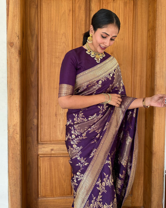 A glam Purple Color Banarasi Soft Silk Saree With Blouse Piece
