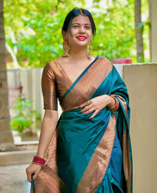 Tending Teal Banarasi Soft Silk Saree With Blouse Piece